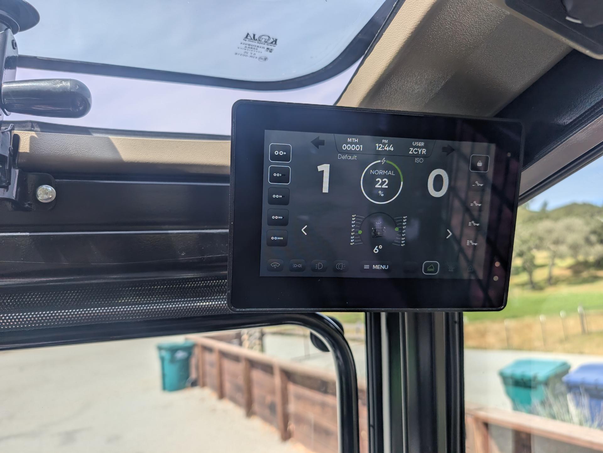 Digital display showing battery level and operating status