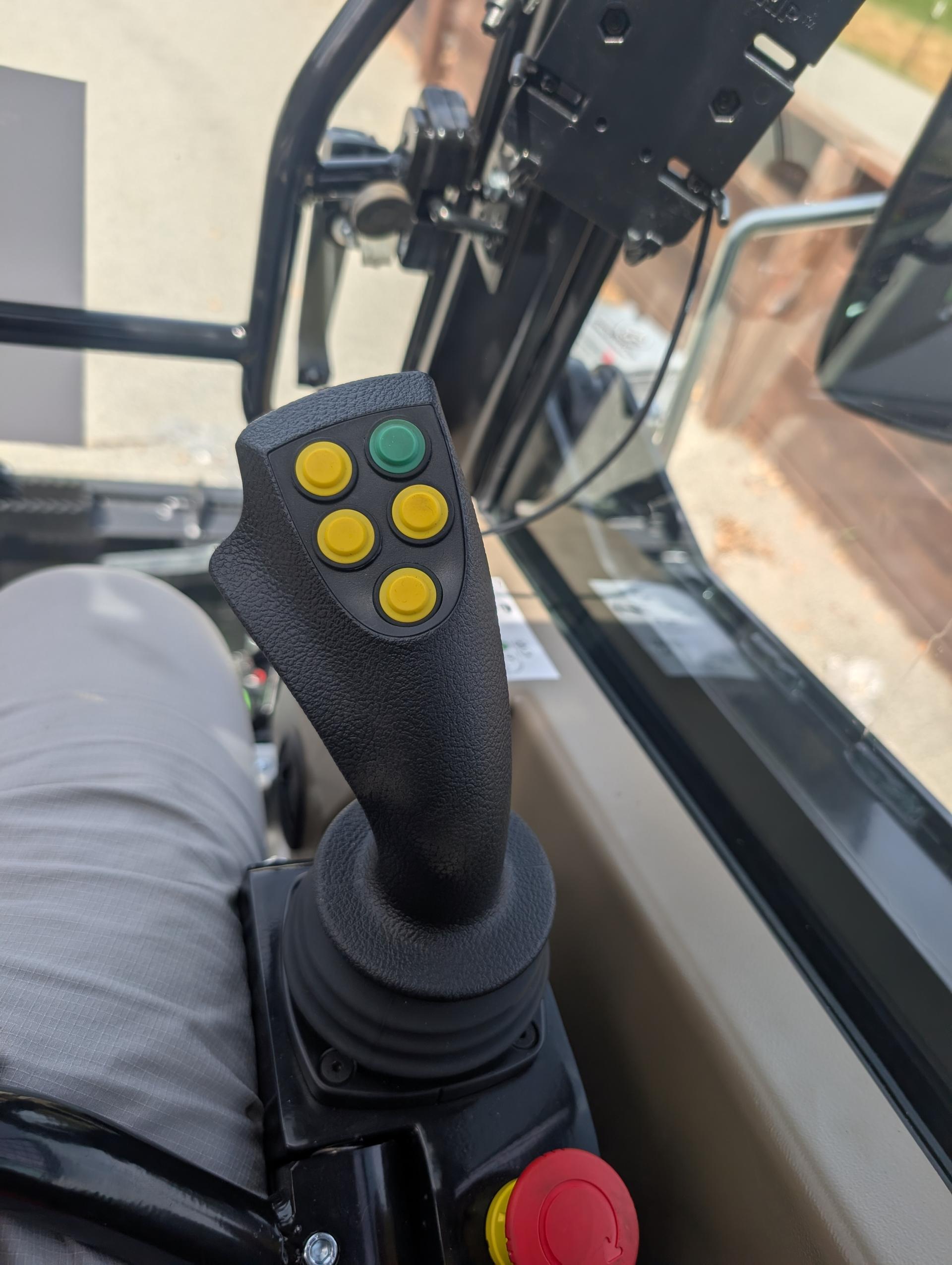 Ergonomic joystick controls with function buttons